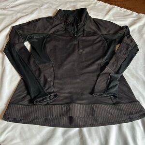Lululemon 1/4 zip.  Black and gold.   Womens size 10